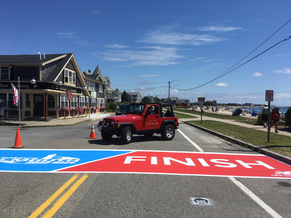Painting the Falmouth Road Race Finish Line 2019